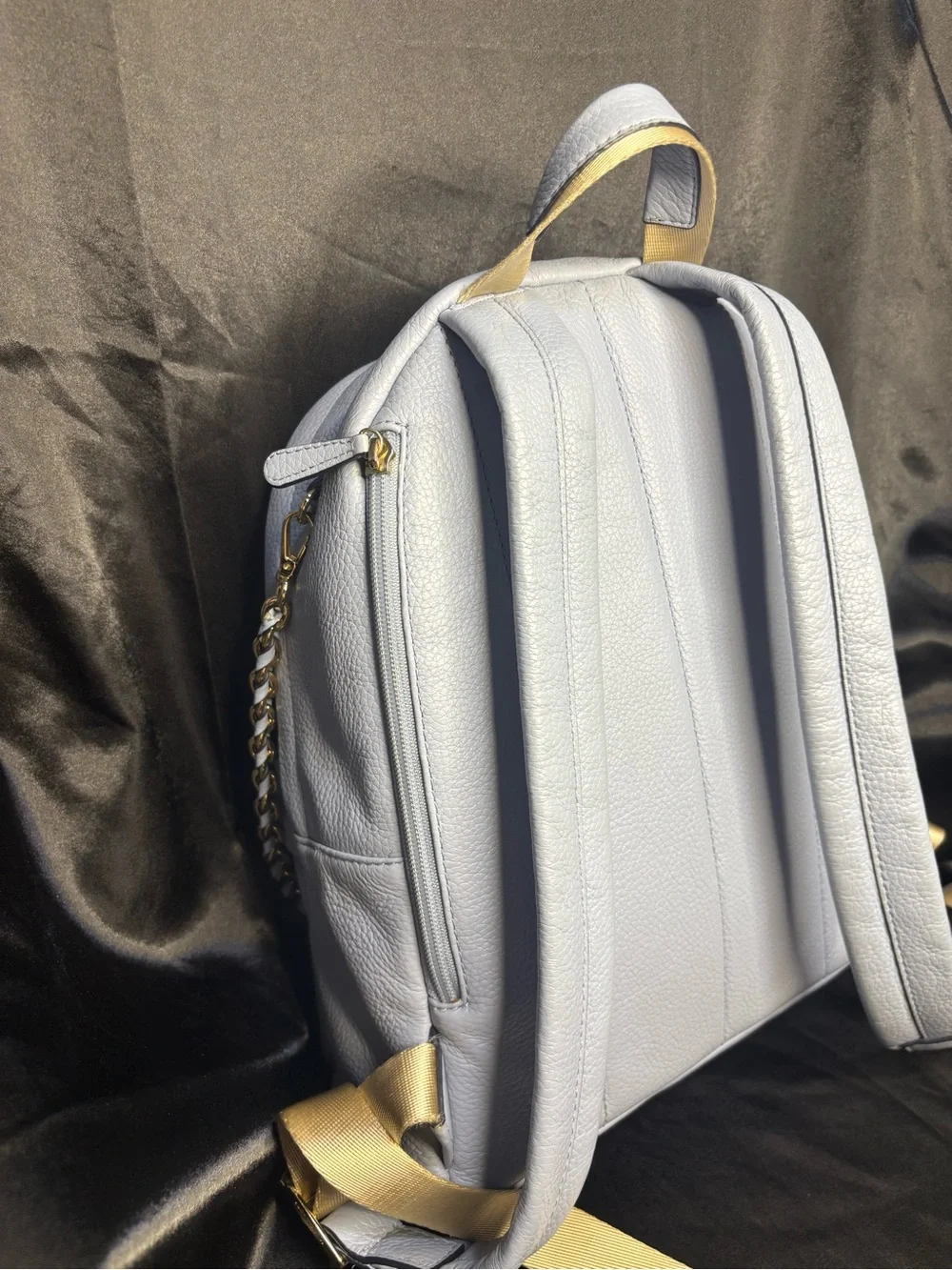 Michael Kors Slater Medium Pebbled Leather Backpack in a pale blue with dust bag